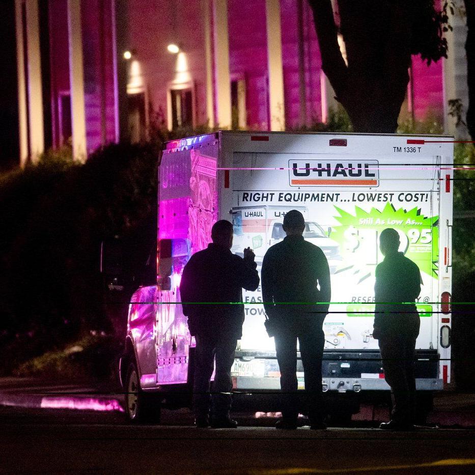 Shots fired, driver hurt and held after truck rams into Coast Guard base in California